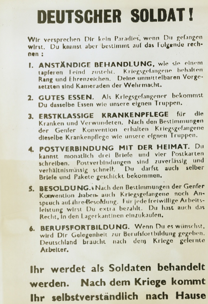 GERMAN SOLDIERS!, 6/22/1944. FRANCE – Here is one side of a pamphlet dropped to the German defenders of Cherbourg by allied airmen.  Printed in German, the message does not promise paradise to surrender Nazis, but it does guarantee fair treatment as becomes a brave enemy, good food, first rate hospital care, mail facilities, payroll status and opportunities for furthering education in skilled laborsCredit: Signal Corps radio telephoto from Acme;