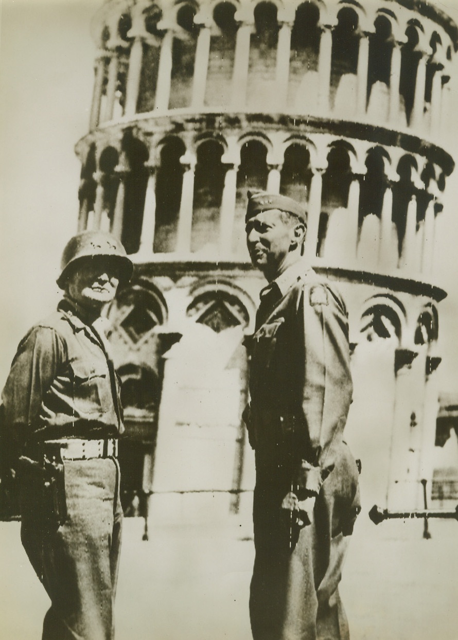GENERAL CLARK VISITS PISA, 9/6/1944. ITALY—Undamaged by the Fifth Army in its successful fight for the city of Pisa, Italy, the famous Leaning Tower is visited by Maj. Gen. Willis D. Crittenberger (left), of the Fifth Army, and Lt. Gen. Mark W. Clark, Fifth Army’s Commanding General. Credit: Acme photo via Army radiotelephoto;