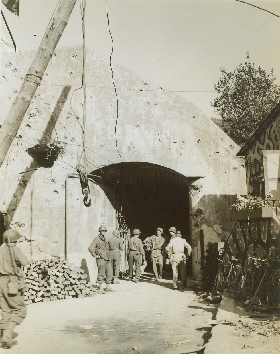 Historic Fort Captured by Yanks, 9/21/1944. BELGIUM – At one time called the strongest fort in Belgium, and one of the most impregnable in the world, Eben Emael has recently been taken from the Nazis by American troops. The Germans took the fort when they overran the Low Countries in 1940. Here, Yanks stand at one of the fort’s entrances. Credit Line (ACME Photo by Andrew Lopez for the War Picture Pool);