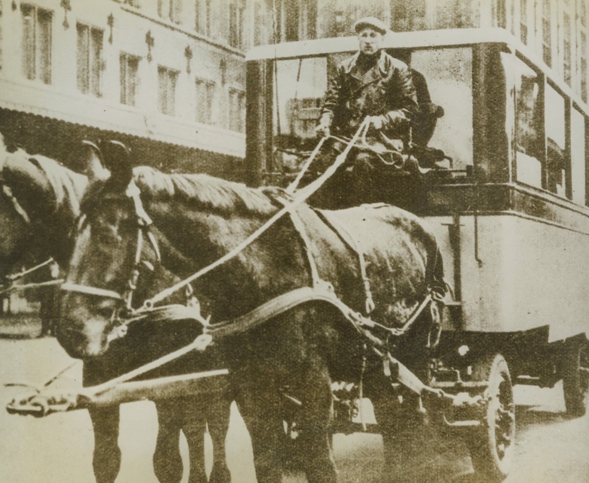 Sunday Bus in Holland has Horsepower (Alive), 9/20/1944. According to the German caption accompanying this photo received from a neutral source, Amsterdam bus service on Sundays is provided by these two-horsepower coaches. With the enemy’s acute fuel shortage at the front the horse-drawn buses are probably the only public transport service in HollandCredit Line (Acme);