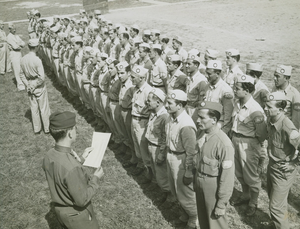 Prisoners to Work at Hospital, 9/27/1944. Chicago – Capt. Alexander Wood calls roll of Italian Service Unit, composed of Italian prisoners of war who are carefully selected on the basis of not having Fascist sympathies, as they check in at Vaughan Hospital in Hines, Illinois, to perform service duties. Credit: ACME;
