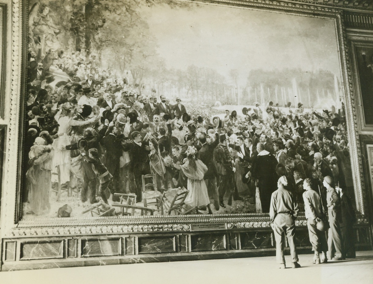 YANKS VIEW FRENCH ART, 9/1/1944. FRANCE—While a guard stands by, three American soldiers gaze with awe at the wall-size paining of the celebrations for the first president of the Republic of France in 1889 as they tour the Chateau de Versailles, Very similar to this painting were the scenes in Paris streets as the American forces entered the city to complete its liberation.;