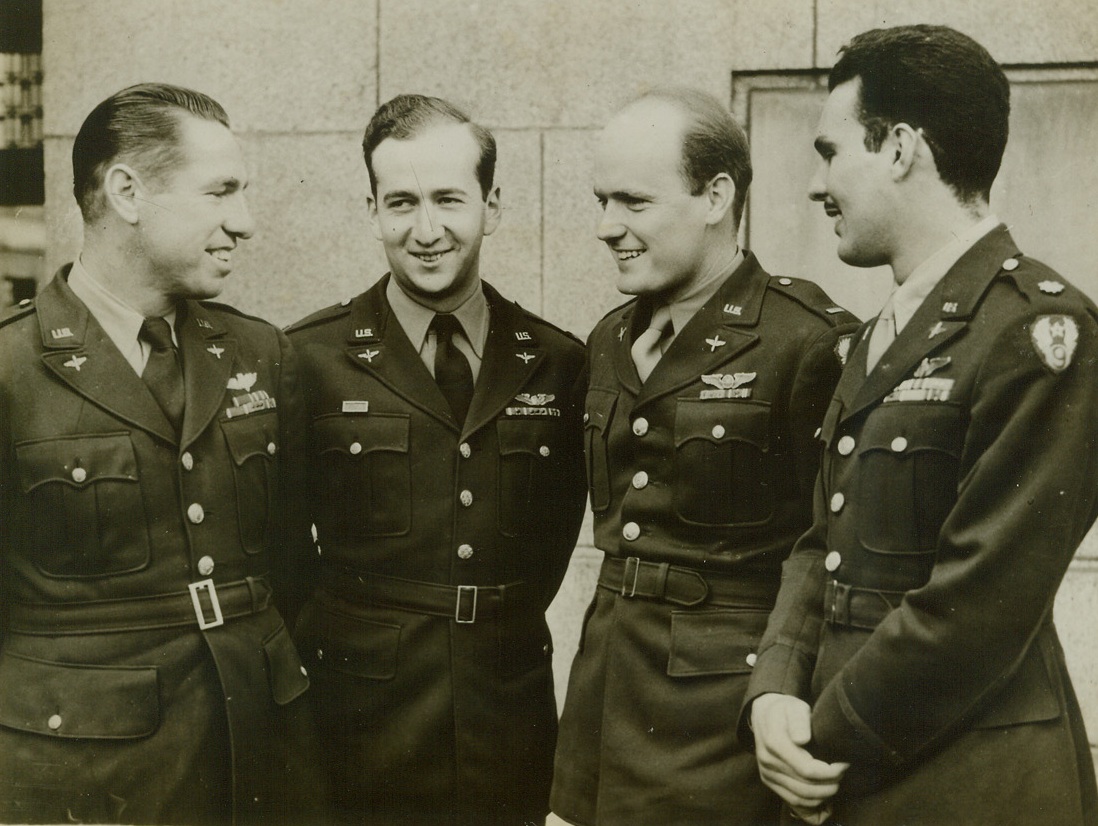 Yank Fliers Who Attacked Flying Bomb Sites, 9/12/1944. London, England – Multi-ribboned American pilots who attacked the German flying bomb sites on the French coast met with other service personnel who were engaged in fighting against the flying bomb menace and held a press interview at the Ministry of Information recently. Left to right: Maj. Charles S. Hudson, Bakersfield, California; Capt. Richard Nickelhoff, Mamoraneck, New York; Lt. B.A. Carroll, Dallas, Texas; and Maj. Albert E. Hill, Wichita Falls, Texas. Credit: ACME;