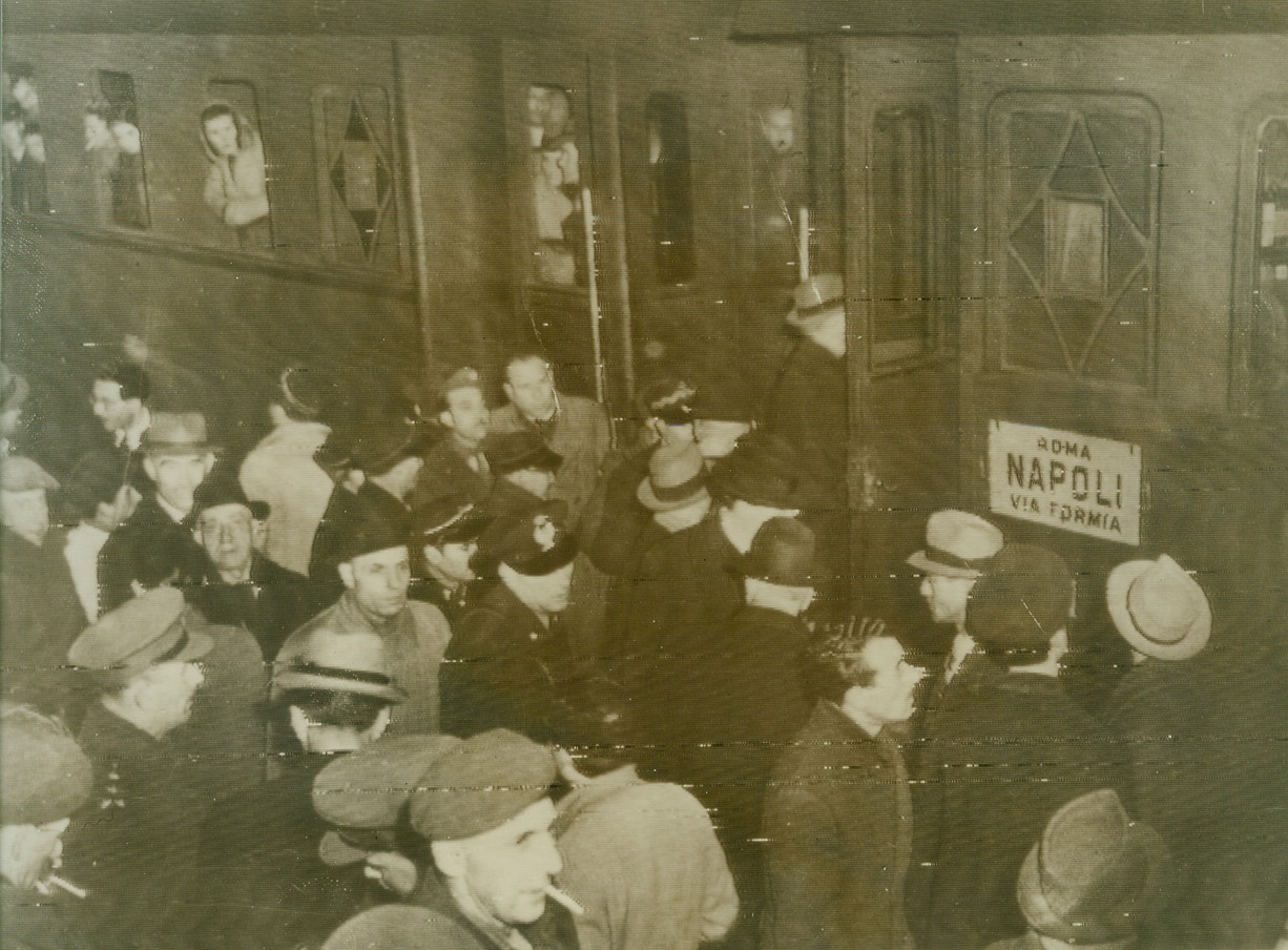 Democracy, Too, Makes Trains Run, 1/23/1945. Italy—Crowds jam the railroad station in Rome as the first civilian passenger train to Naples to operate since 1943 began its 12-hour run. Credit: Stars & Stripes photo via OWI radiophoto from ACME.;