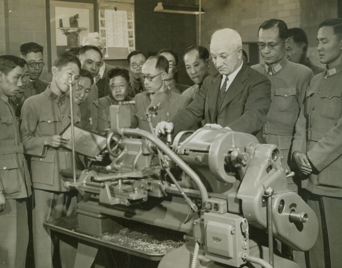 Chinese Officers Enroll at N.U., 1/24/1945. Evanston, Ill.—Nineteen ordnance officers of the Chinese Army, under the direction of General Kiang, who is in charge of the Chinese Army Ordnance in the United States and Canada, begin an eight week course of training in management and manufacturing methods of the department, conducts the students on a tour of the school’s Technological Institute. Credit: ACME.;
