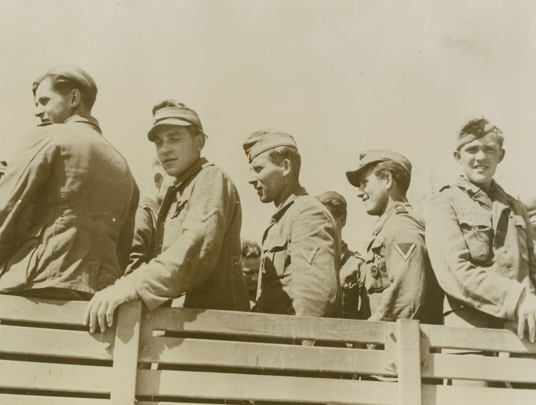 One Truckload Coming Up. ANZIO, ITALY – Carefree and unconcerned with their plight, these German prisoners grin as they are removed by truck from the forward stockade on the Anzio beachhead to permanent encampments behind the front lines. The deluded Nazi warriors still believe that the war will result in a victory for Germany, even after they’ve had a taste of Yankee battle medicine.Credit (ACME) (WP);