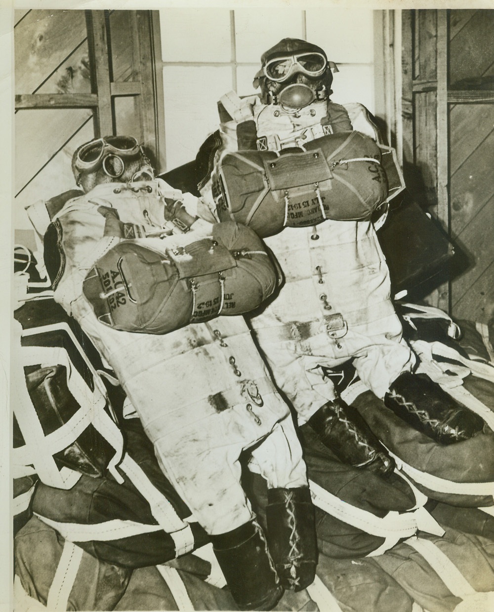 Meet Oscar and Nellie. CALIFORNIA -- Meet Oscar and Nellie, two dummies that serve as reconnaissance agents for paratroopers now on maneuvers "Somewhere in the California Desert." The dummies are dropped first, then if the air is smooth enough, paratroopers follow. Credit: (U.S. Signal Corps from ACME);