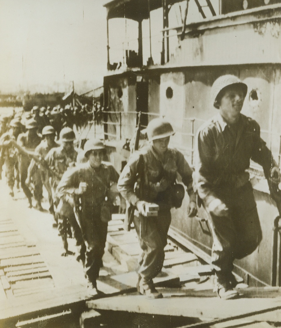 American Rangers Leave for Italy. With Sicily under allied control, U.S. Rangers embark from a port of the Mediterranean Island and set out for Italy. They don’t know that Italy is virtually ours, and have no idea of the sort of battles that confront them. Credit: OWI Radiophoto, ACME via U.S. Army Signal Corps;