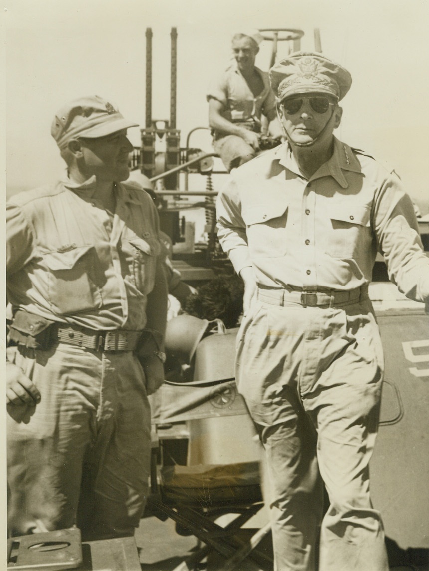 ACME Cameraman Killed By Sniper's Bullet. Frank Prist, Jr., ACME Newspictures' photographer with the war picture pool, was killed by a Jap sniper's bullet on the 24th Division front in western Leyte, it was announced today. Prist (left) is shown here with Gen. Douglas MacArthur aboard a PT boat at Tacloban, Leyte, He was the only cameraman aboard the cruiser which took MacArthur to the Philippines. He has been overseas since February, 1942, when he left Australia with MacArthur's forces to follow the entire campaign up though the Pacific to the Philippines.;