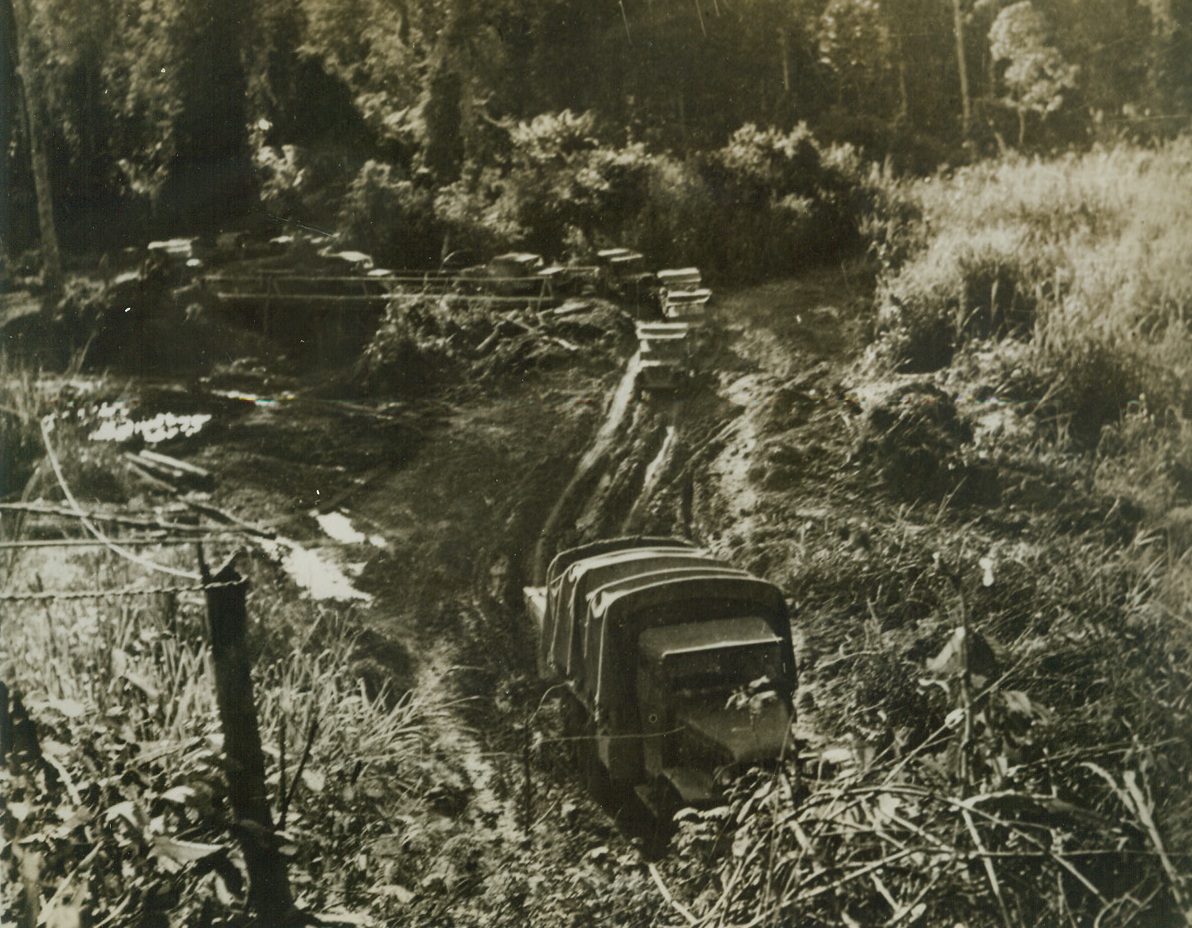 Rough Going. Northern Burma – Carrying food and supplies to allied forces battling the Japs in Northern Burma, these heavy U.S. Army trucks find the going mighty rough as they beat their way over soggy jungle terrain.  Scene is the end of the Ledo road, the new overland supply route to China that is now under construction in Northern Burma. Credit line –WP—(ACME);