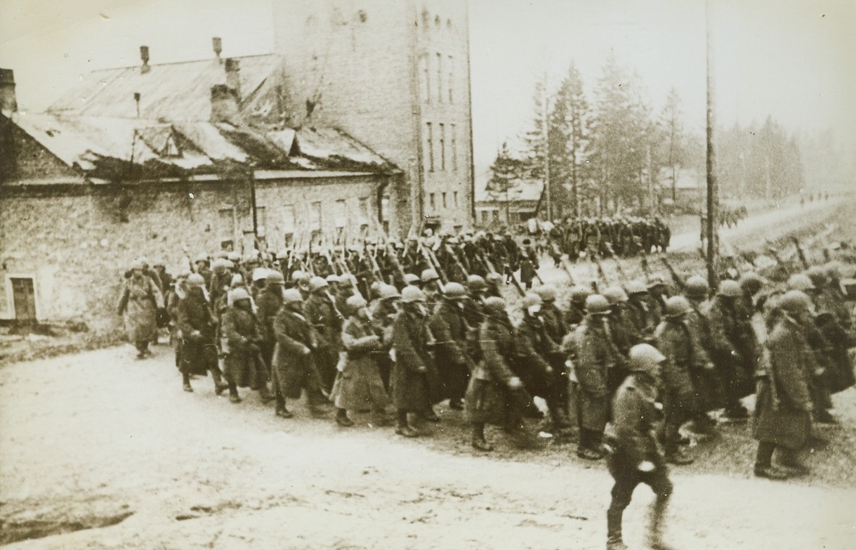 Soviets on the War Path. Russia—Despite temporary setbacks, the Russians surge westward, with fresh fighting power, such as these soldiers, continually swelling their fierce battling ranks. This column of infantrymen passes through an unnamed Soviet village on the way to the front.;