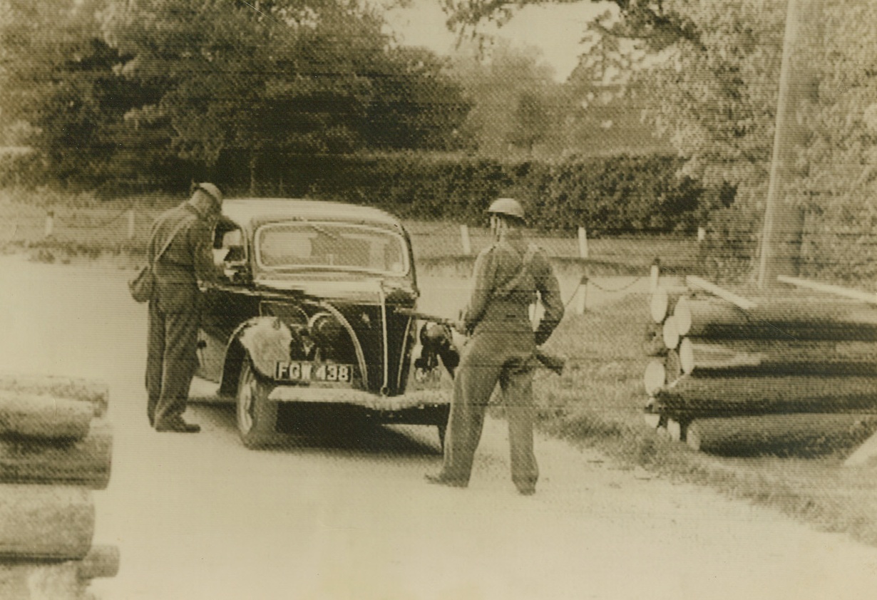 British house guardsmen escort downed Nazi airman. DOVER, ENGLAND - British house guardsmen escort downed Nazi airman.;