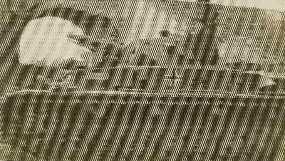 A Nazi Panzer Unit patrols outside Paris, France.