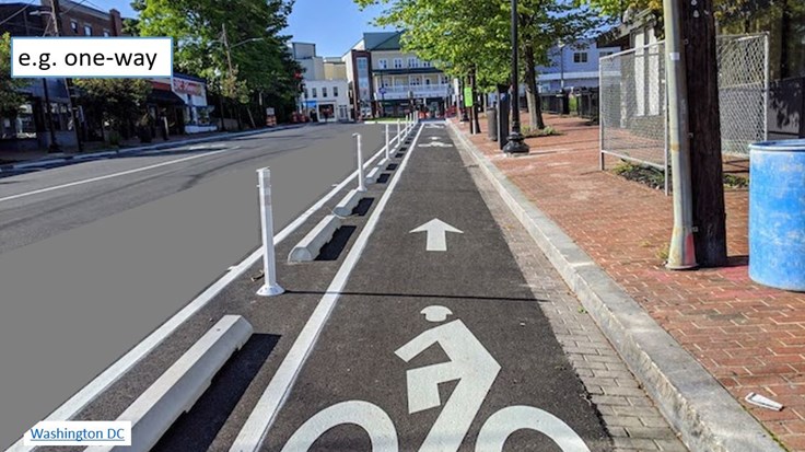 Example of a one-way bicycle facility with stops and delineators.