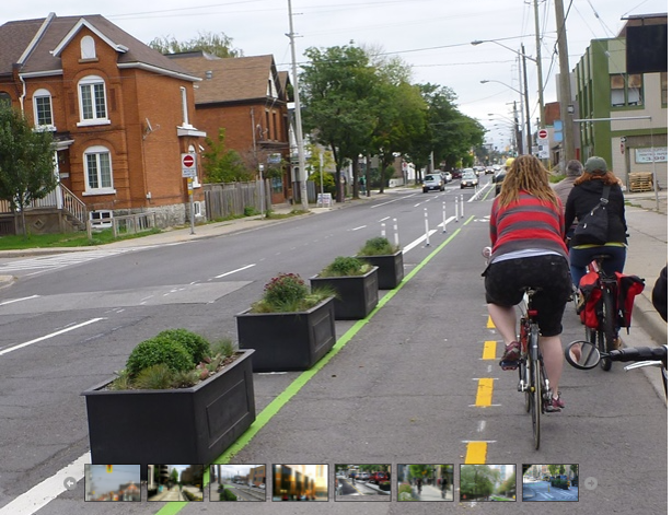 Example of planters plus delineators protecting a two-way cycle track.