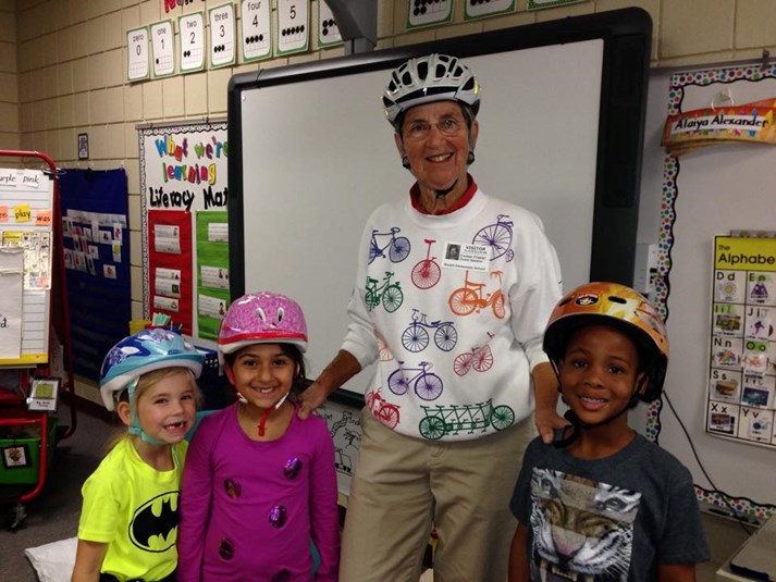 Coreen Frasier, Voting Member of the BFCC, teaching kids to ride bikes.