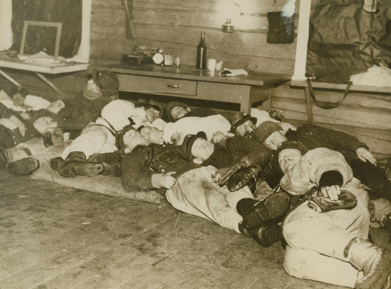 Well-earned Rest, 1/19/1940  FINLAND – Finnish soldiers asleep on the floor of a shelter near the Northern Front, before resuming their efforts  to repel Russian troops.Credit Line (Acme);