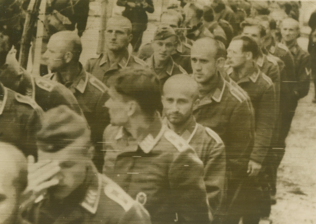 FRENCH, TOO, TAKE PRISONERS, 5/20/1940  SOMEWHERE IN FRANCE—This French censor approved photo, radioed to New York from Paris, May 20, shows German prisoners, taken by the French armies, as they arrived at camp. Credit: Acme radio photo;