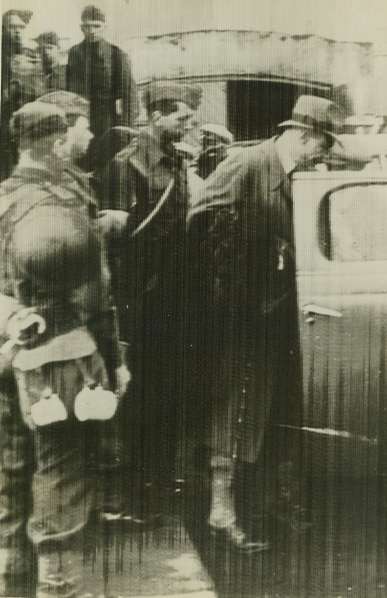 British Arrest German Consul In Iceland, 5/30/1940  Reykjavik - Dr. Gerlach, German Consul General in Reykjavik, surrounded by soldiers just after his arrest following the British occupation of Iceland. Credit: ACME Cablephoto via Western Union;