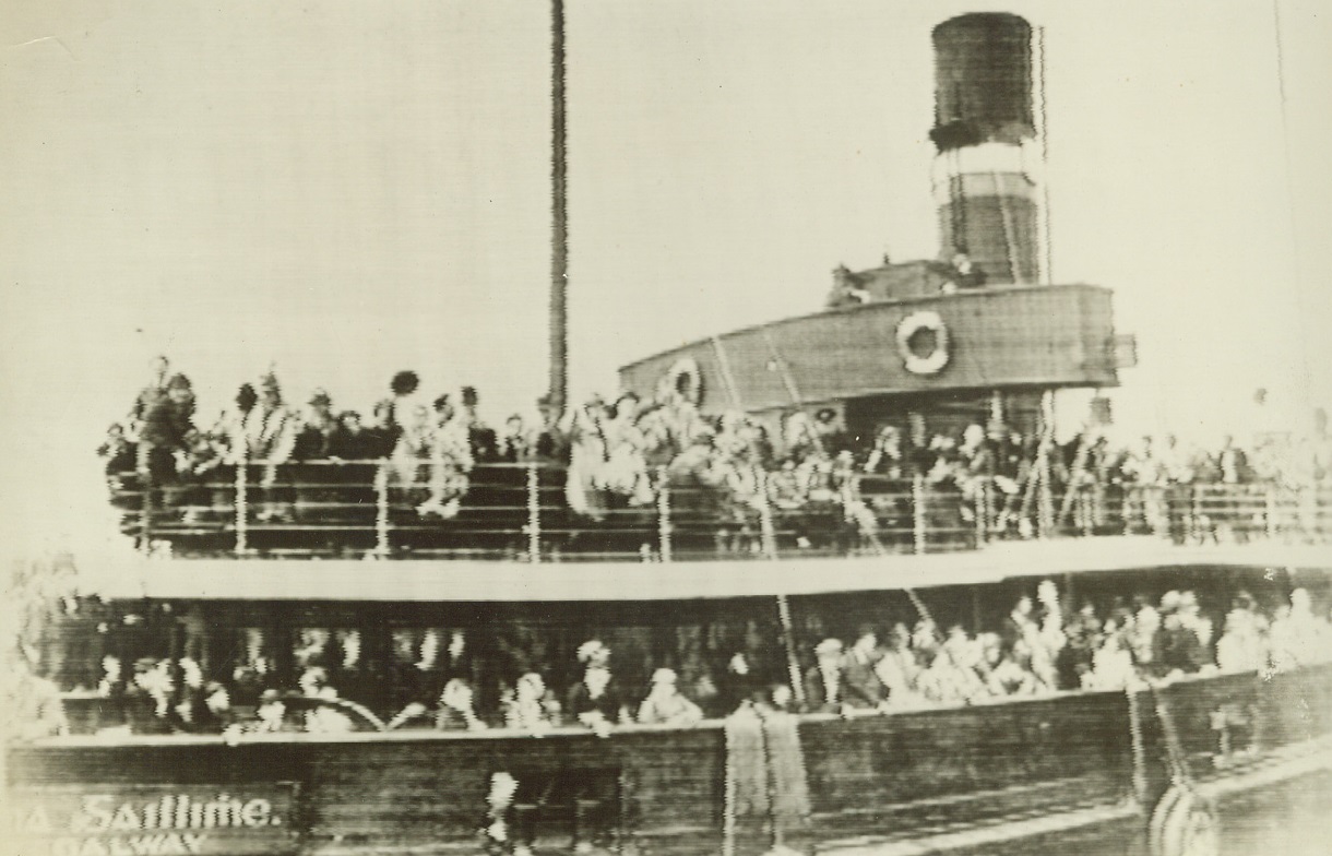 No Title, 6/2/1940  Galway, Ireland -- Americans leaving on the liner President Roosevelt are pictured on the trawler that is taking them to the ship. Credit: ACME;