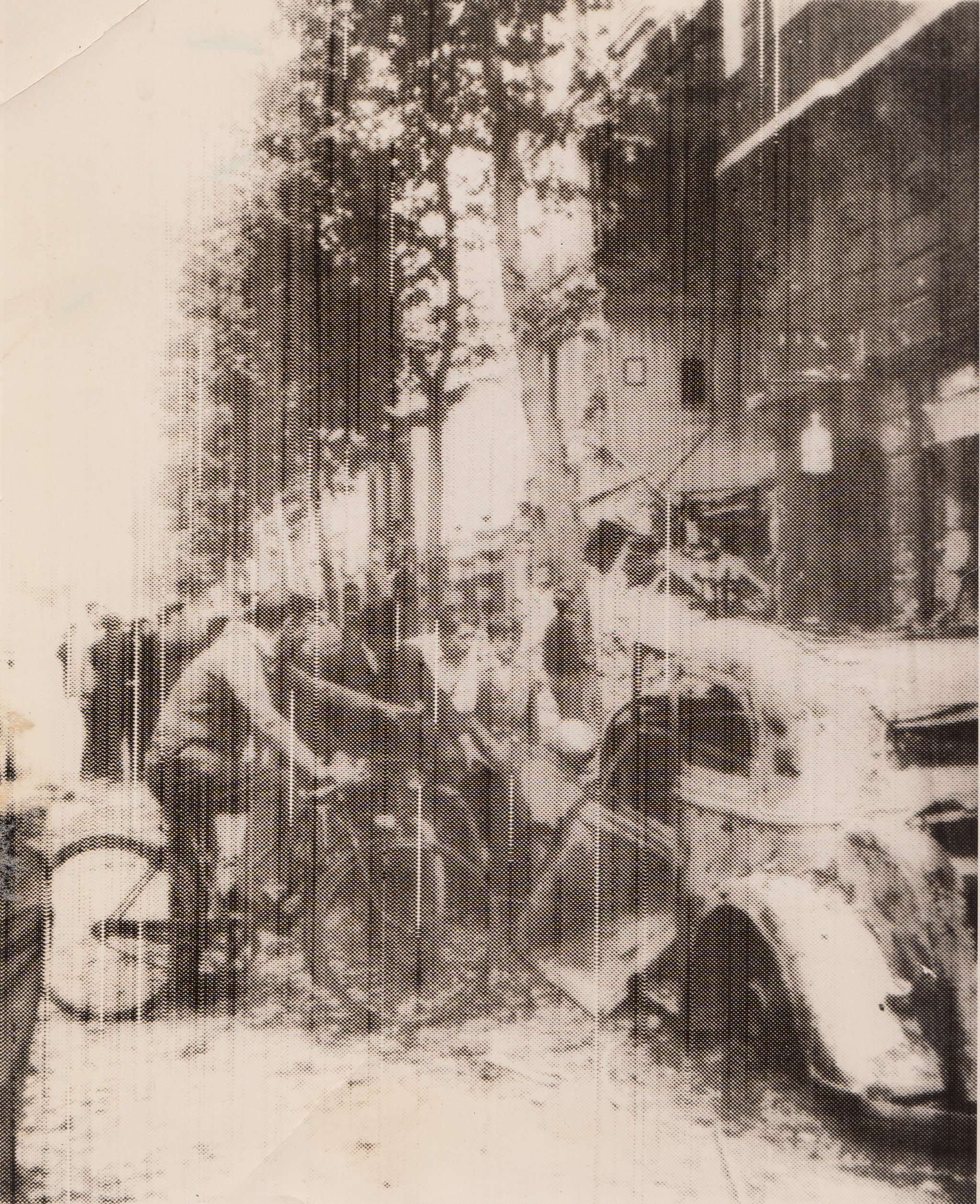 DESTRUCTION FROM THE SKY, 6/4/1940  PARIS—Parisians examine an automobile wrecked and burned, the French censor said, during a German air raid on the French Capital, June 3. Note front of building in right background has been blown out. Photo radioed from Paris to New York, June 4.;