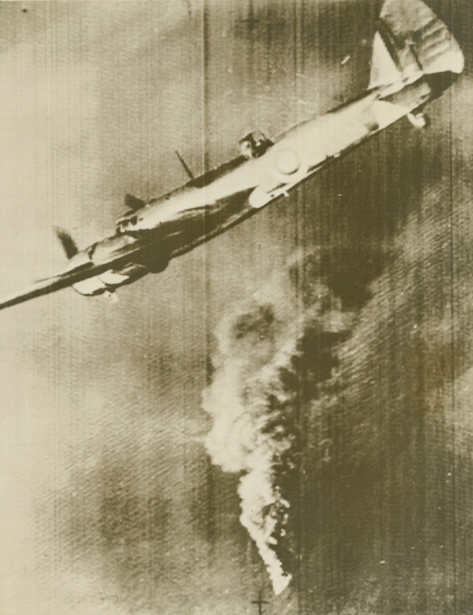 Tanker Blazes in the Channel, 7/14/1940  London – A British bomber flies above a blazing enemy tanker in the English Channel as Great Britain lashes out against enemy shipping in reprisal to raids upon her own merchant marine. Photo passed by British censor and sent from London to New York via Western Union cable, July 14th. Credit: ACME;