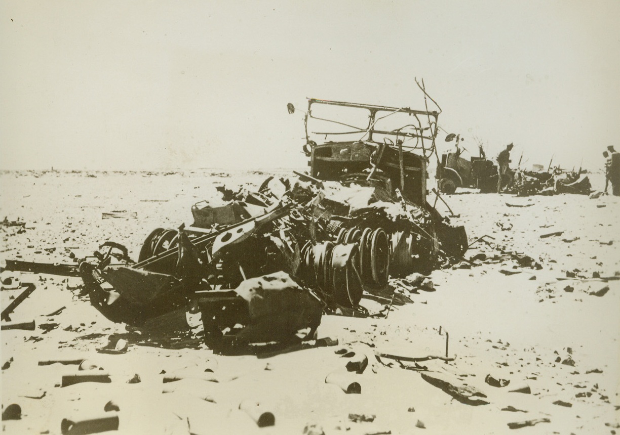 British Column Wrecked by Italians, 8/18/1940  British Somaliland—The caption for this picture, passed by German censor, said: “A column of enemy trucks that were making an advance on Italian territory in Africa. They were demolished by the marksmanship of the Italian air arm.” Credit: ACME.;