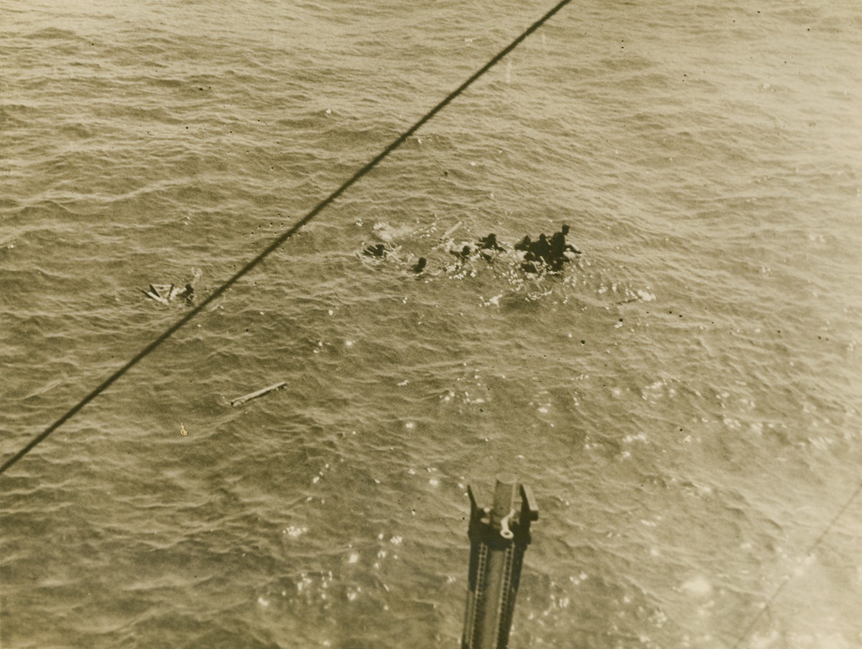 ITALIAN SAILORS IN MEDITERRANEAN, 9/9/1940  ON THE MEDITERRANEAN SEA – Italian sailors cling to wreckage just before rescue. These men were members of the crew of the Italian cruiser, Bartolomeo Colleoni, world’s fastest cruiser, which was sunk by the Australian cruiser Sydney in an engagement in the Mediterranean Sea early this summer. Credit Line (ACME);