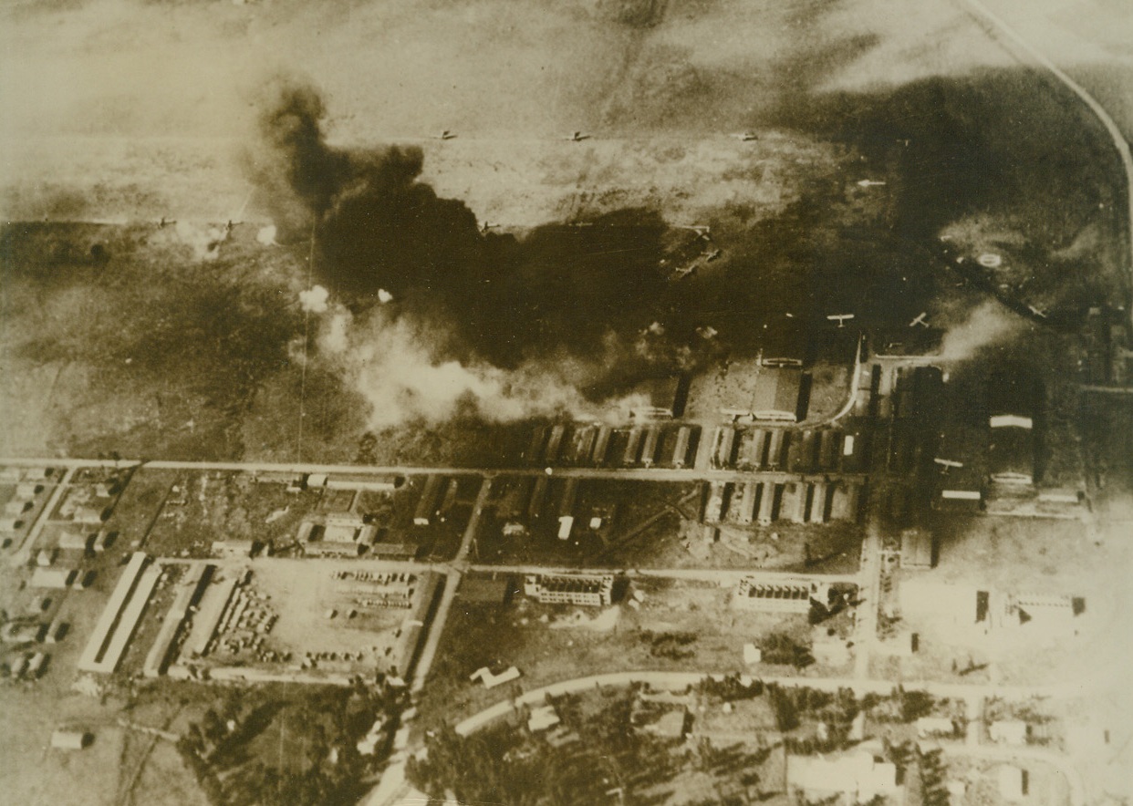 The Bombing of Ethiopian Capital, 9/30/1940  Addis Ababa - - This is the official photograph of a royal Air Force raid on the military airfield at Addis Ababa, capital of Ethiopia.  The official R.A.F. communiqué issued at the time stated that direct hits were registered on four hangars and that a gasoline fire was started. Credit line (ACME);