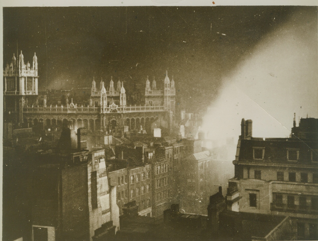 Destructive Flames Sweep London's "City", 1/14/41  LONDON, ENGLAND -- The night sky is brilliantly lighted by the flames sweeping London's historic "City" in the worst raid of the war on London in which German bombers dropped thousands of incendiary bombs. The Guildhall, the famous Wren Church of St. Bride's and dozens of other buildings of history were ruined in the raid.  Credit: (ACME);