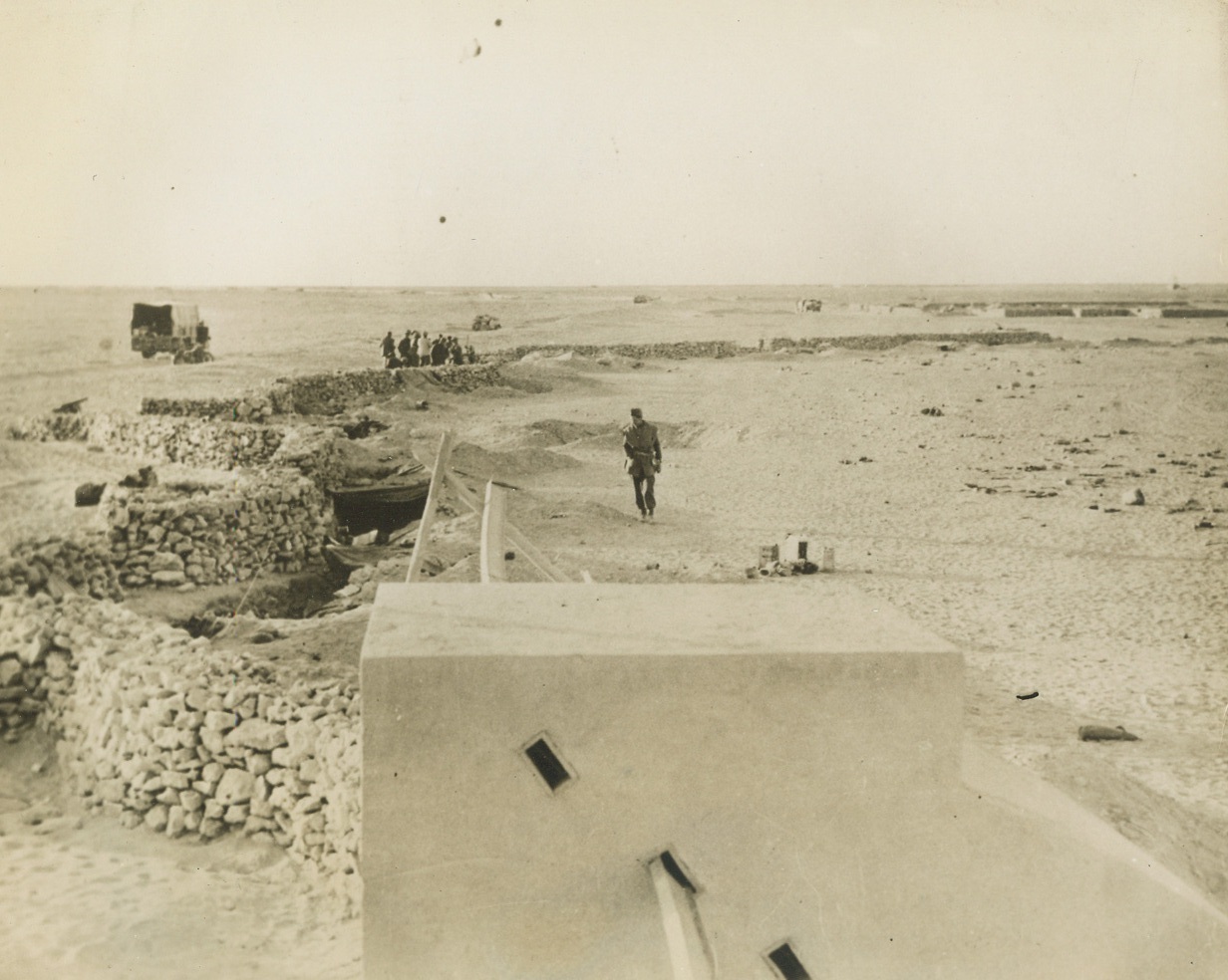 ... Defense Captured By British Troops, 2/5/41  …Libya - - This general view gives some idea of the Italian defenses here, which the British troops broke through in their recent swift attack on the fortified Italian Libyan seaport.  The British claim that 34,000 troops four generals and vast amounts of war materials were captured in the fall of the city. Credit line (ACME);