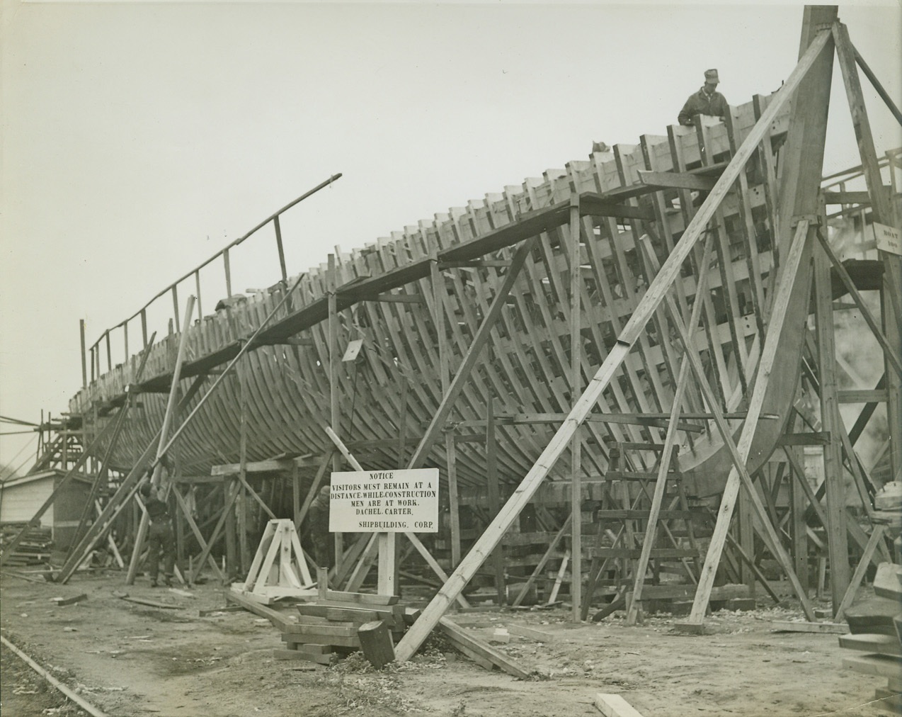 Milano Shipyards Get Defense Orders, 10/30/41  Benton Harbor, Mich.: One of many mine-sweepers under construction at the Dachel-Carter Shipbuilding Co. yards, here, is shown as it neared final stages, with framework finished. Large diesel engines will be installed in the completed boats. Credit: ACME.;