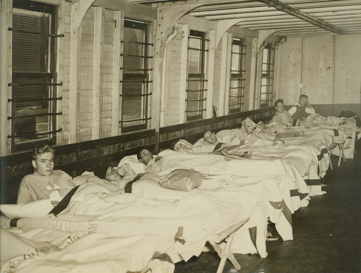 War Wounded Are Brought Home—Pearl Harbor Victims, 12/31/41  San Francisco—Here is the first picture of the war-wounded in San Francisco—U.S. seamen victims of the Japanese attack on Pearl Harbor Dec. 7. Above, they await transfer to a hospital after their arrival. Passed by Navy censor. Credit: ACME.;